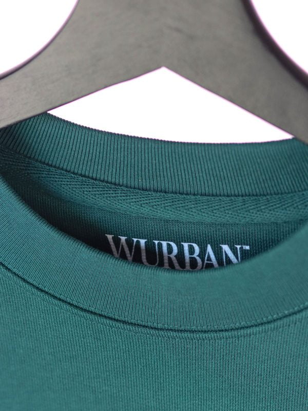 de never waste talent groene sweater van wurban wear is een sport sweater vol motivatie